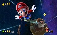 Screenshot of Mario blasting away from planets of Good Egg Galaxy and Space Junk Galaxy. From E3 2006 build of Super Mario Galaxy