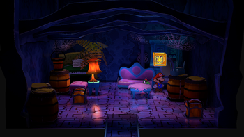 Mario next to the Shine Sprite in the treasure room in Creepy Steeple in the remake of the Paper Mario: The Thousand-Year Door for the Nintendo Switch.