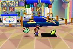 Mario finding a Star Piece in front of the blue station in Shy Guy's Toy Box in Paper Mario
