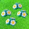 Squared screenshot of flowers from Super Mario 3D World.