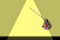 The punching bag hits Wario back