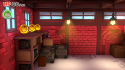 Mario standing near 3 100-Coins in Toad Town of The Origami King.