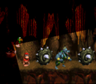 Torchlight Troubleb The fifth level of Gorilla Glacier, Torchlight Trouble takes place in a dark cave level, exclusively featuring Squawks, who carries a torchlight to help the Kongs see their way ahead. Oil drums and Mincers appear as obstacles throughout the cave.