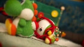 Screenshot of the semi-final scene in Yoshi's Woolly World: Adventure Guide, the scene has Yoshi swallowing Baby Bowser, whom he then lays tied up with red yarn