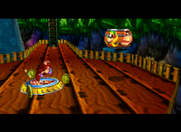 A setup for a Golden Banana for Donkey Kong and a set of yellow Banan Coins in Fungi Forest.