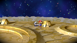 Mario near the rock containing a Ultra Mushroom on the Moon of Paper Mario: The Thousand-Year Door for Nintendo Switch.