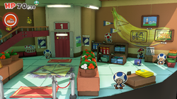 Mario standing near a cash register containing a group of coins in Overlook Tower of The Origami King.