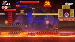 Screenshot of Fire Mountain level 3-3 from the Nintendo Switch version of Mario vs. Donkey Kong