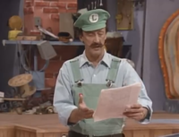 Luigi reading E.C.'s quality assurance papers in the Super Mario Bros. Super Show! episode "E.C. The Extra Creepy."