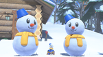 A Snowman in-between two larger snowmen near the course