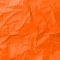 Orange crumpled paper background