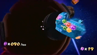Luigi having fallen through the stone planet in the Good Egg Galaxy in Super Mario Galaxy.