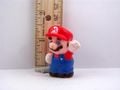A finger puppet of Mario from Super Mario Land
