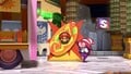 Mario and Vivian posing at the Hot Dog cut-out in the remake