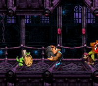 Donkey Kong Country 3: Dixie Kong's Double Trouble!: Kiddy Kong holding a Steel Barrel at the Koin of Krack-Shot Kroc