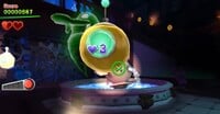 A Strobomb being tossed at a Greenie in Luigi's Mansion Arcade