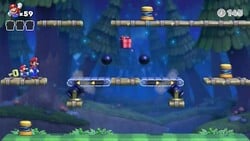 Screenshot of Mystic Forest Plus level 7-4+ from the Nintendo Switch version of Mario vs. Donkey Kong