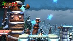 A round of snowflakes soars above Donkey and Cranky Kong in Forest Folly.