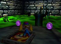 A set of purple Banana Coins in Creepy Castle.