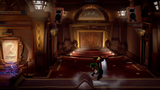The theater entrance with the Poltergust lifting Luigi off the ground to avoid getting hit by the long waving hallway carpet, which was lifted by a blue ghost wearing a top hat, and there's a poster with a piano with a "3" coming out of it in reference to the game's title