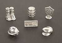 Tokens from the Nintendo Monopoly board game.