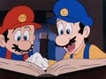 Luigi informing Mario about the necklace's identical counterpart