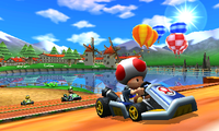 E3 2011 screenshot of Toad racing in Daisy Hills in Mario Kart 7.