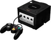 Black Nintendo GameCube with controller