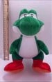 A plushie of Yoshi from Super Mario RPG: Legend of the Seven Stars
