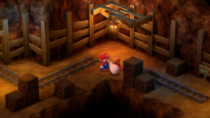 Last Crook leaving behind a Flower Tab after being defeated in the mines of Moleville of Super Mario RPG.