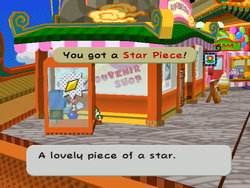 Mario getting the Star Piece behind the telephone booth of Glitzville in Paper Mario: The Thousand-Year Door.