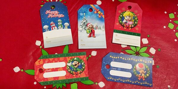 Photograph of several Mario-themed holiday gift tags