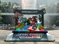Jewel Circuit Challenge installation depicting Super Mario characters racing on Rainbow Road