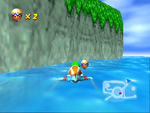 Tiptup flies to a Golden Balloon at the far end of the Timber's Island coast in Diddy Kong Racing.