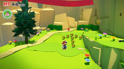 Mario standing near 8 Coins in Picnic Road of The Origami King.