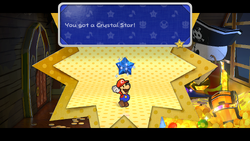 Mario getting the Sapphire Star in Pirate's Grotto of Paper Mario: The Thousand-Year Door for Nintendo Switch.