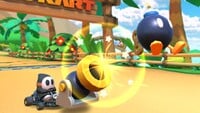 Black Shy Guy using the Bob-omb Cannon on 3DS Cheep Cheep Lagoon R in Mario Kart Tour