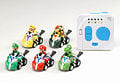 Five racers (Mario, Luigi, Yoshi, Bowser, and Wario) with a remote control. This set of toys features the ability to use items and faithfully reproduces the roulette function. This set was manufactured by Takara Tomy.