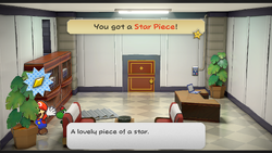 Mario getting the Star Piece behind the plant in Grubba's office in the remake of the Paper Mario: The Thousand-Year Door for the Nintendo Switch.