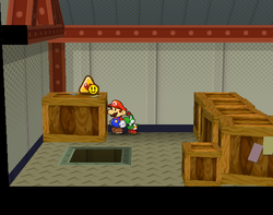 Mario near the HP Plus P badge in Glitz Pit of Paper Mario: The Thousand-Year Door.