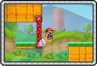 Mini Mario performing a Wall Jump in Mini Mario & Friends: amiibo Challenge