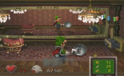 A Boo Ball being sucked by Luigi