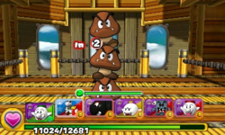 Screenshot of 3-Goomba Tower as the alternative boss of World 4-Airship, from Puzzle & Dragons: Super Mario Bros. Edition.