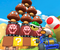 Thumbnail of the Mii Cup challenge from the 2023 Mario Tour; a Goomba Takedown challenge set on N64 Luigi Raceway