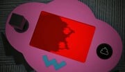 A shadowy figure on the game console's screen