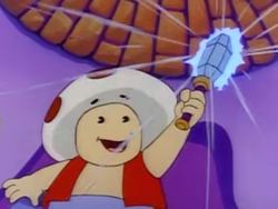 Toad holding the wand in A Toadally Magical Adventure