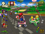 Pre-release screenshot of Mario and Koopa driving down the merged section