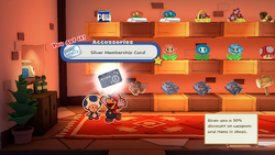 Mario being given the Silver Membership Card by the item shop shopkeeper in Toad Town of The Origami King.