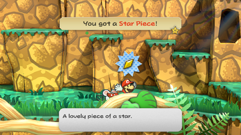 Mario getting the Star Piece behind a trunk in the jungle area of Keelhaul Key in the remake of the Paper Mario: The Thousand-Year Door for the Nintendo Switch.