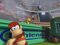 Diddy Kong and Koopa Troopa assist with stopping the Bob-omb onslaught.